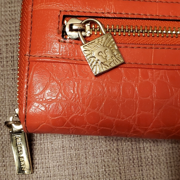 Anne Klein zippered wallet, orange with gold zippers and embellishment lock. - Picture 5 of 15